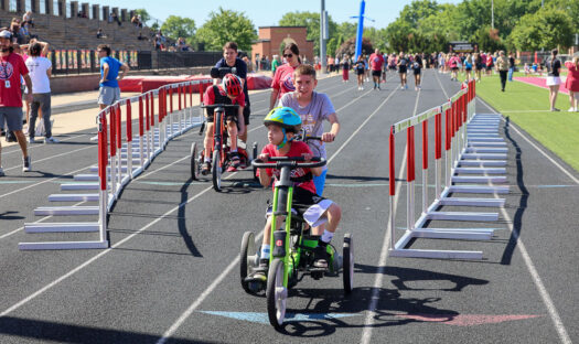 Lawrence school district students shine at Pat Grzenda Adaptive Triathlon
